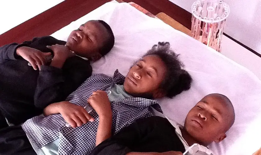 Children resting during a light session in Arusha, Tanzania