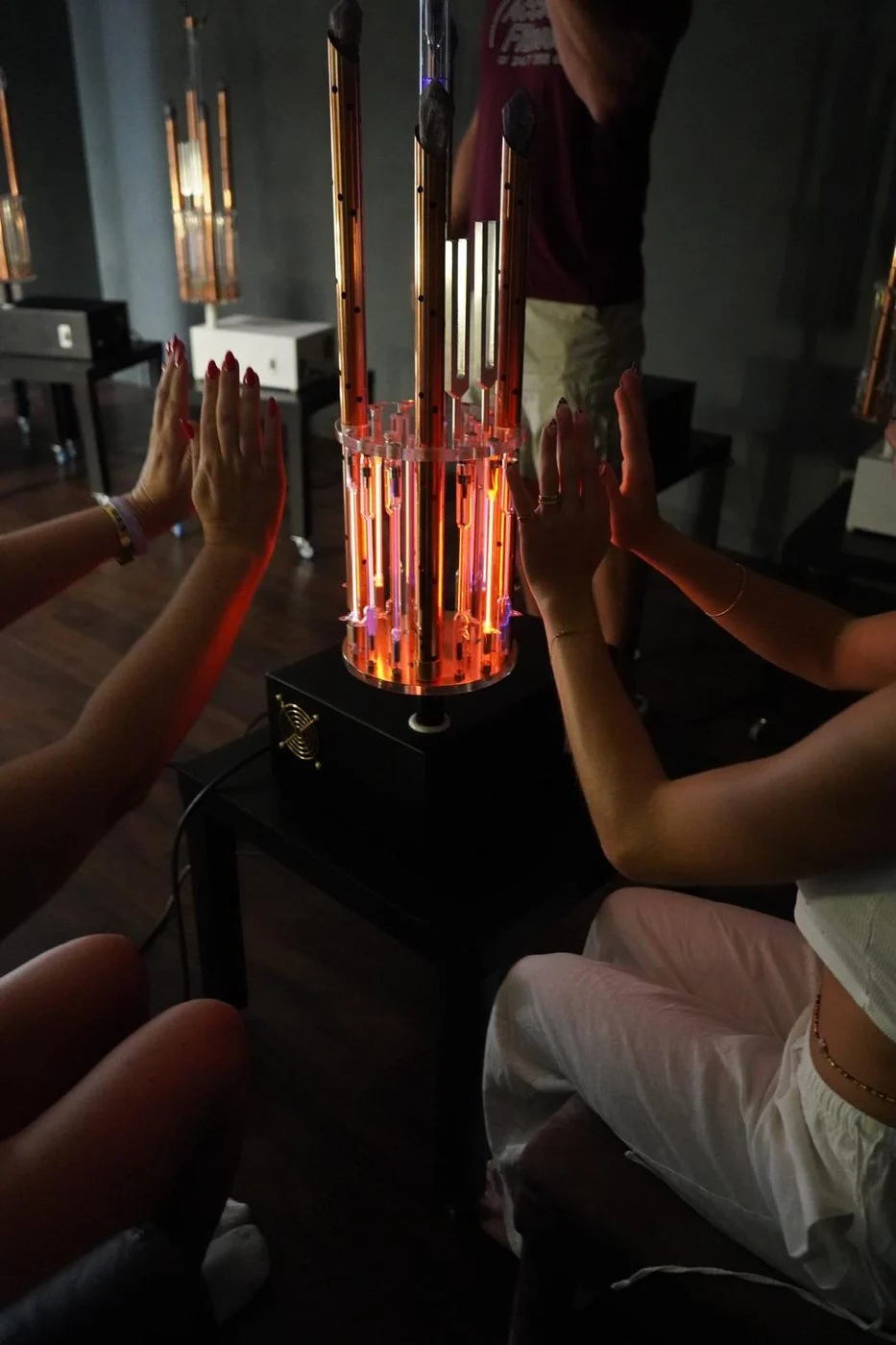 Hands drawn to the light